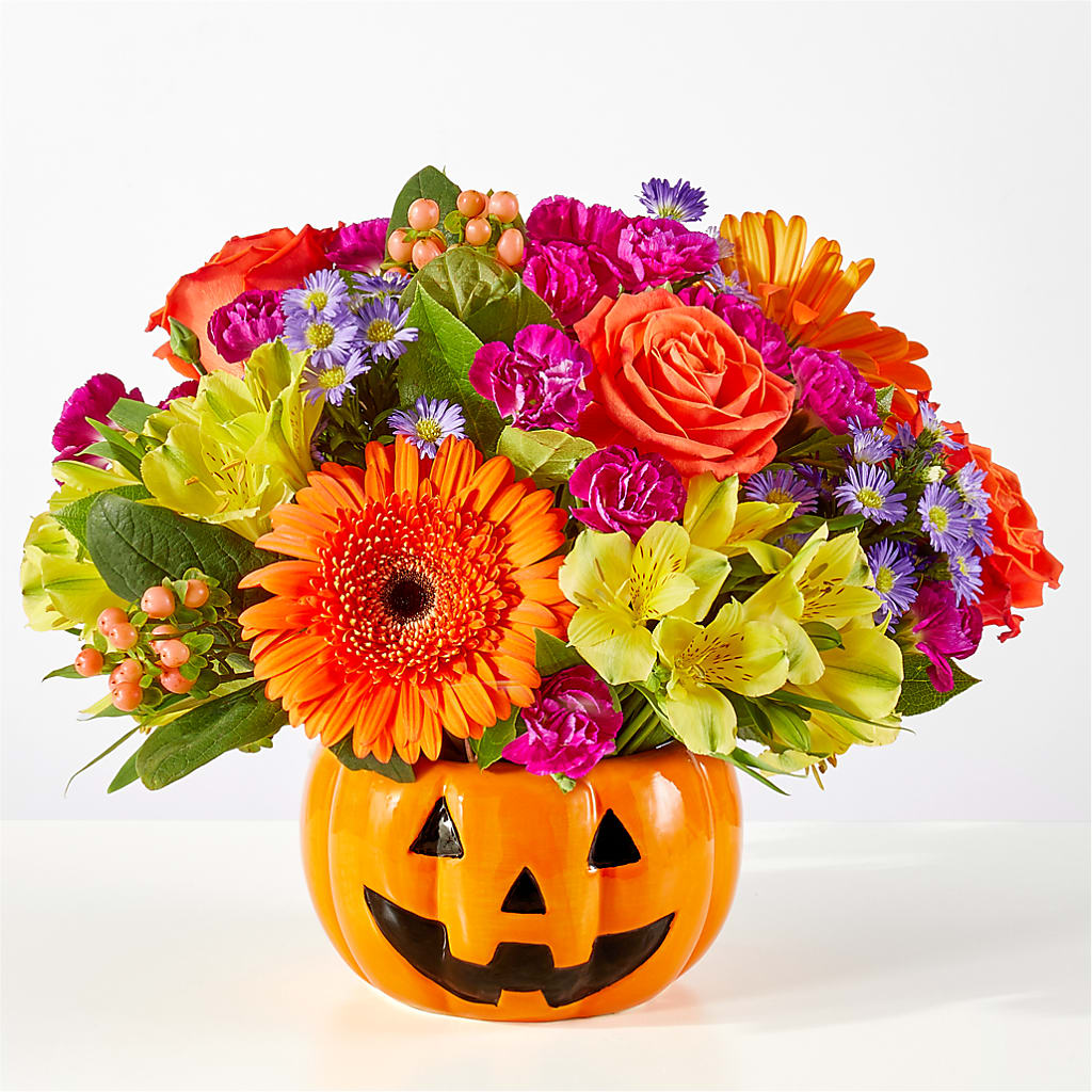 Tricks & Treats Pumpkin flower arrangement by Honeybee Floral