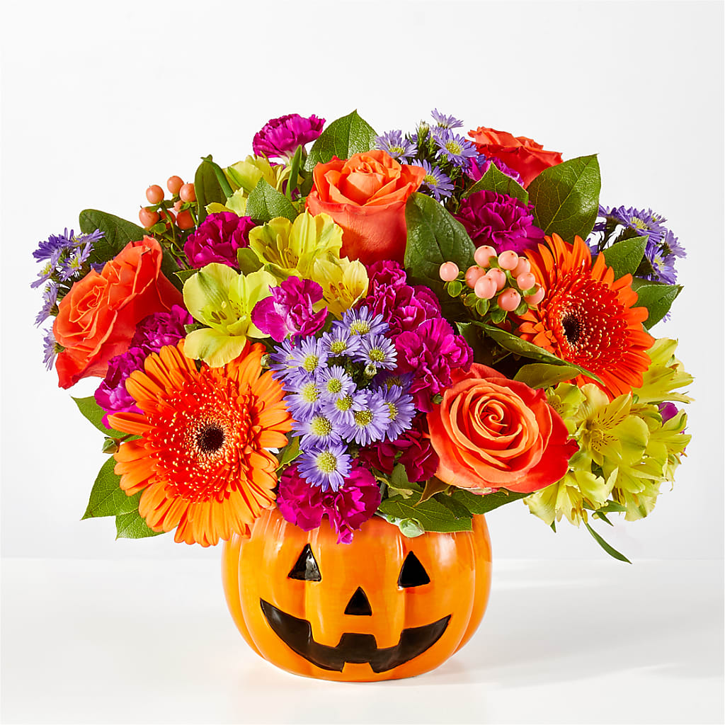 Tricks & Treats Pumpkin flower arrangement by Honeybee Floral