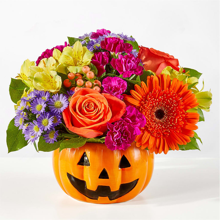 Tricks & Treats Pumpkin flower arrangement by Honeybee Floral