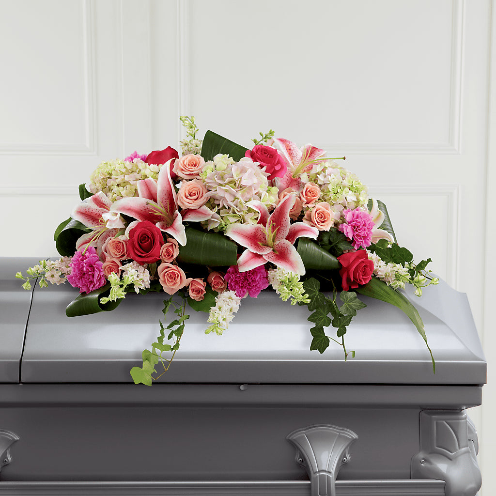 Splendid Grace Casket Spray flower arrangement by Honeybee Floral