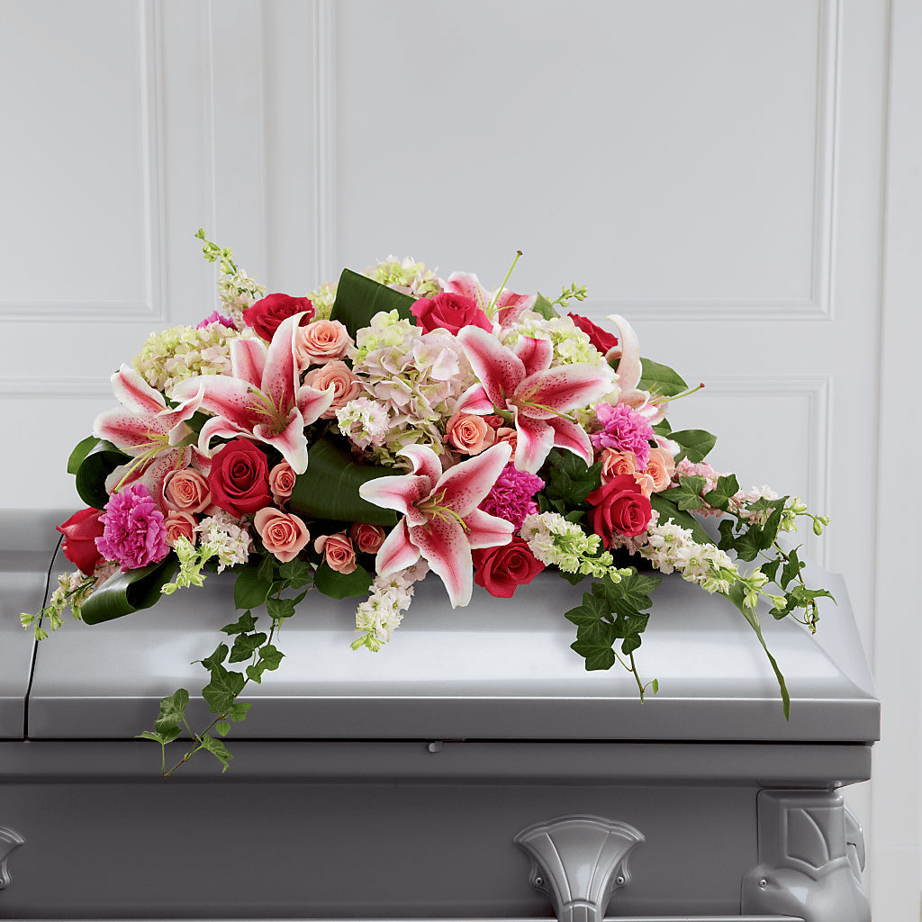 Splendid Grace Casket Spray flower arrangement by Honeybee Floral