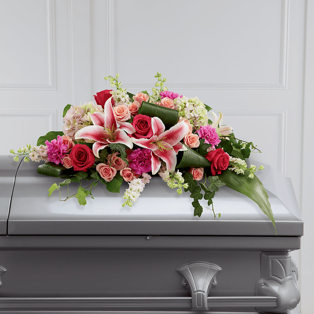 Splendid Grace Casket Spray flower arrangement by Honeybee Floral