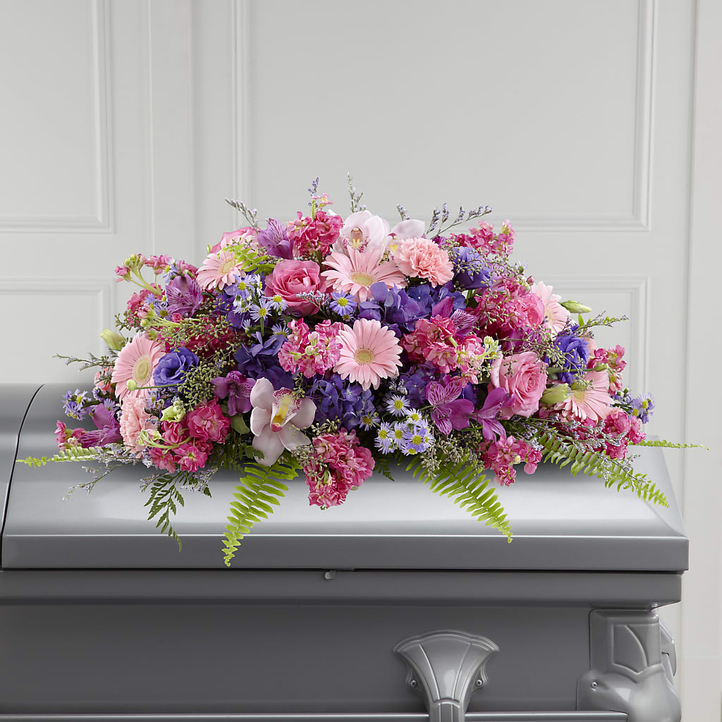 Glorious Garden Casket Spray flower arrangement by Honeybee Floral