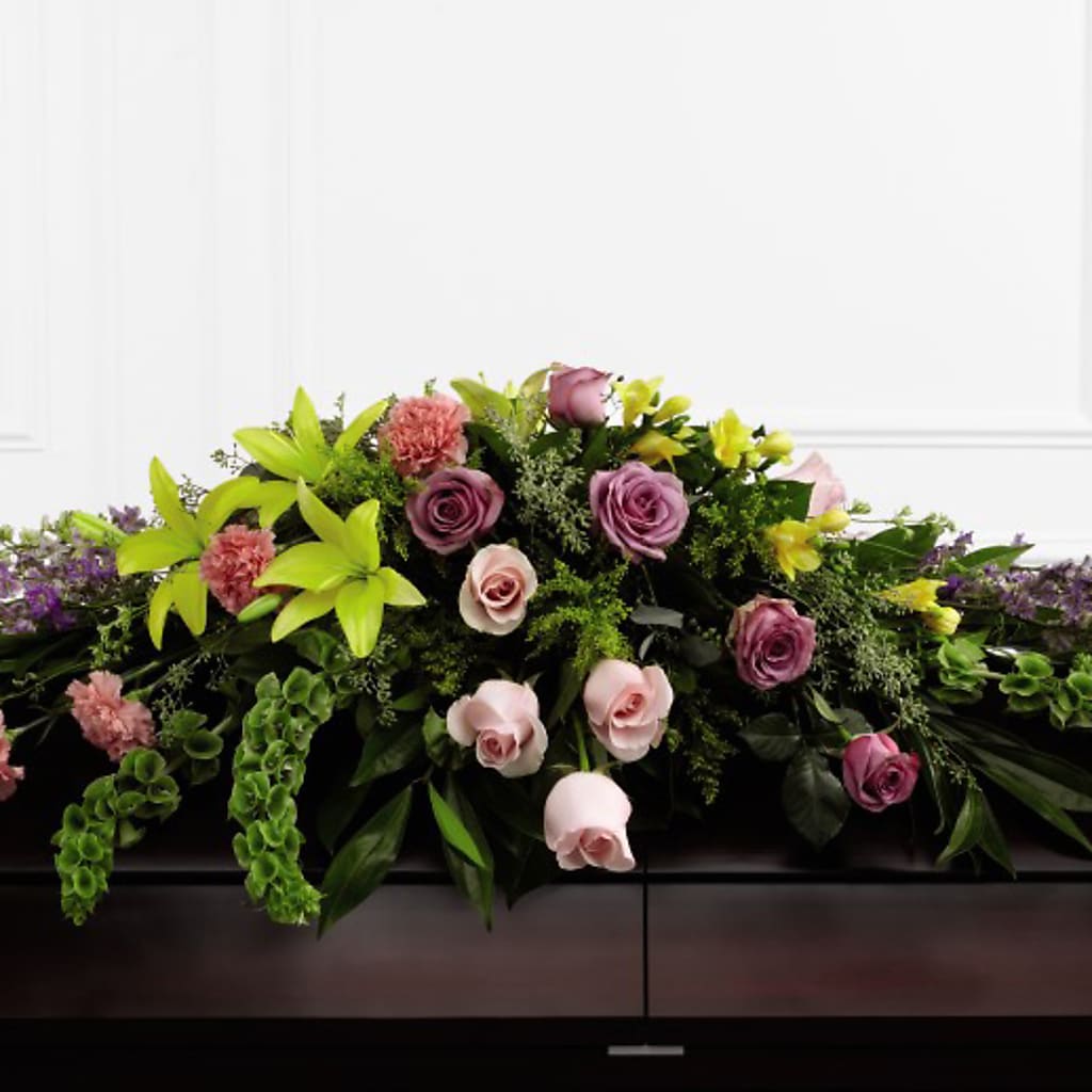 Forever Beloved Casket Spray flower arrangement by Honeybee Floral