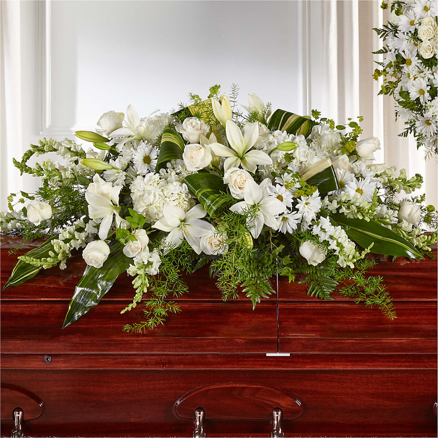 Abundance Casket Spray flower arrangement by Honeybee Floral