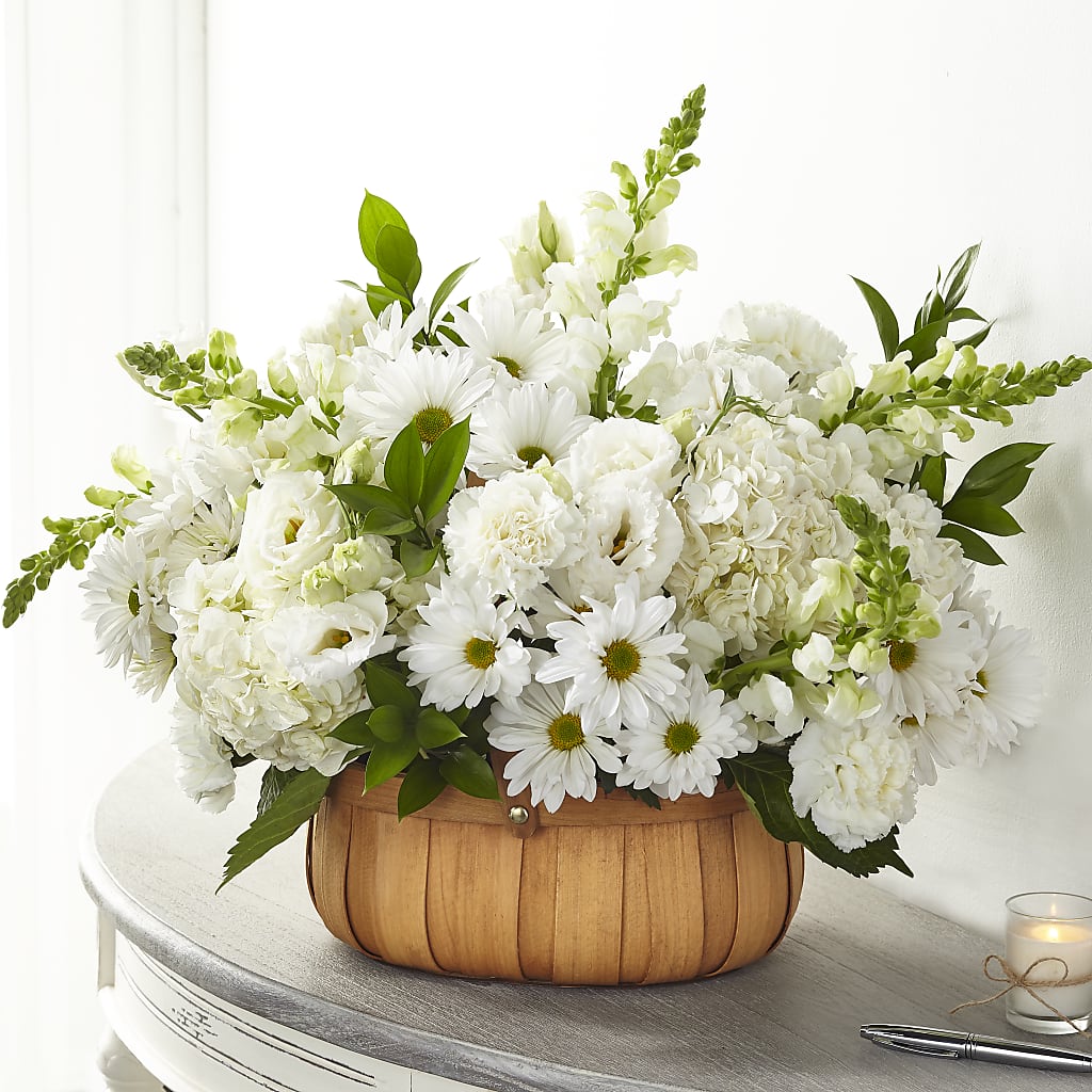 Pure Ivory Basket flower arrangement by Honeybee Floral