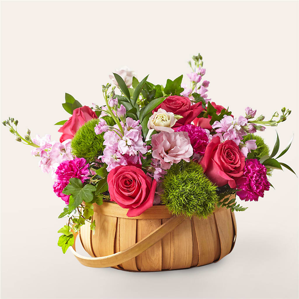Radiance in Bloom Basket flower arrangement by Honeybee Floral