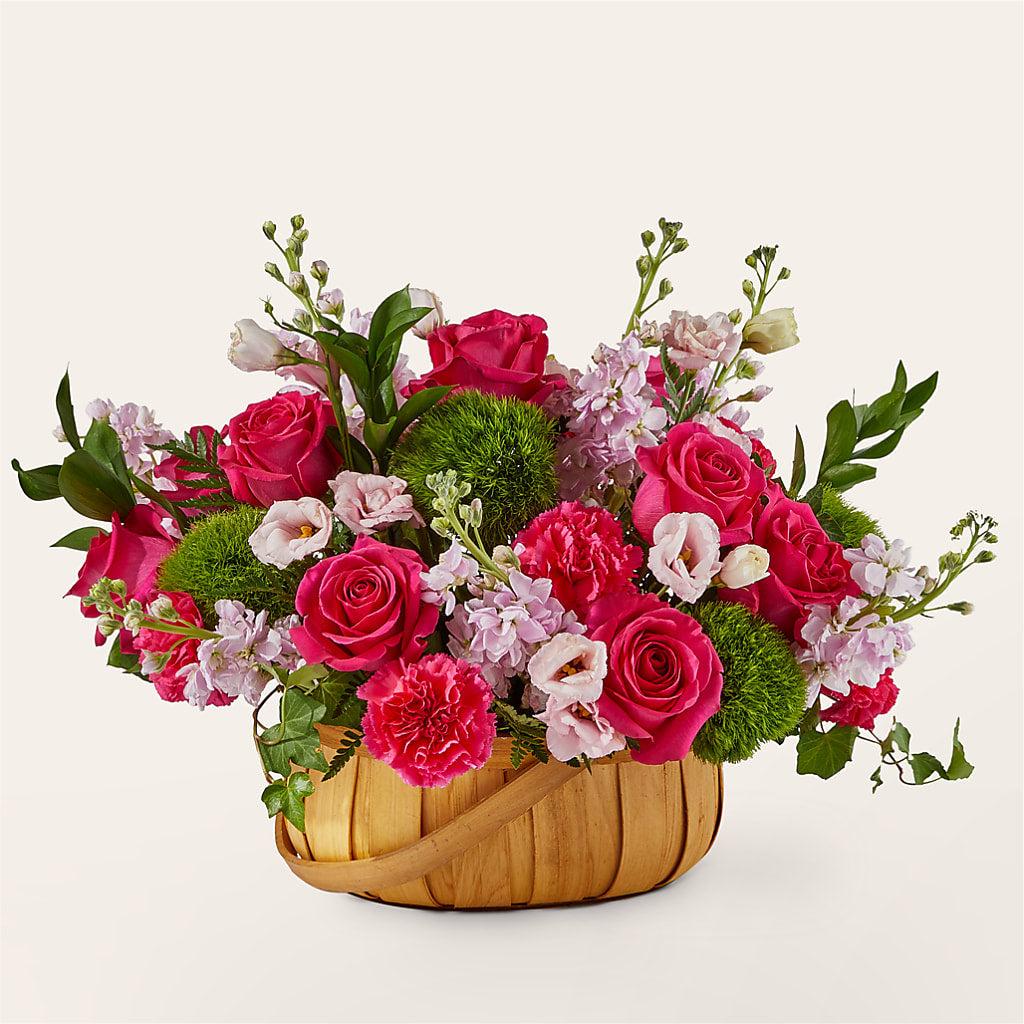 Radiance in Bloom Basket flower arrangement by Honeybee Floral