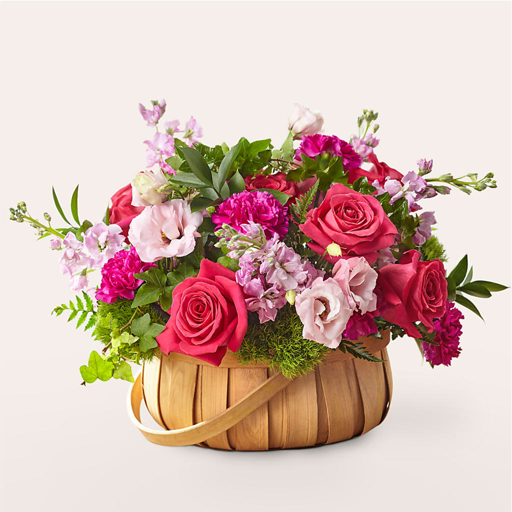 Radiance in Bloom Basket flower arrangement by Honeybee Floral