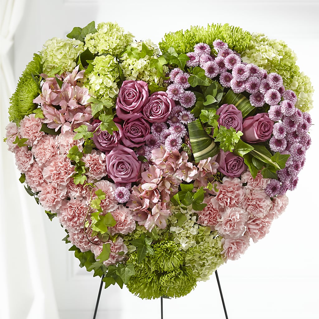 Heartwarming Standing Heart flower arrangement by Honeybee Floral