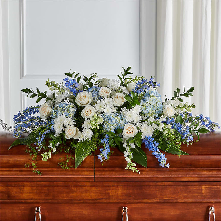 Timeless Essence Casket Spray flower arrangement by Honeybee Floral