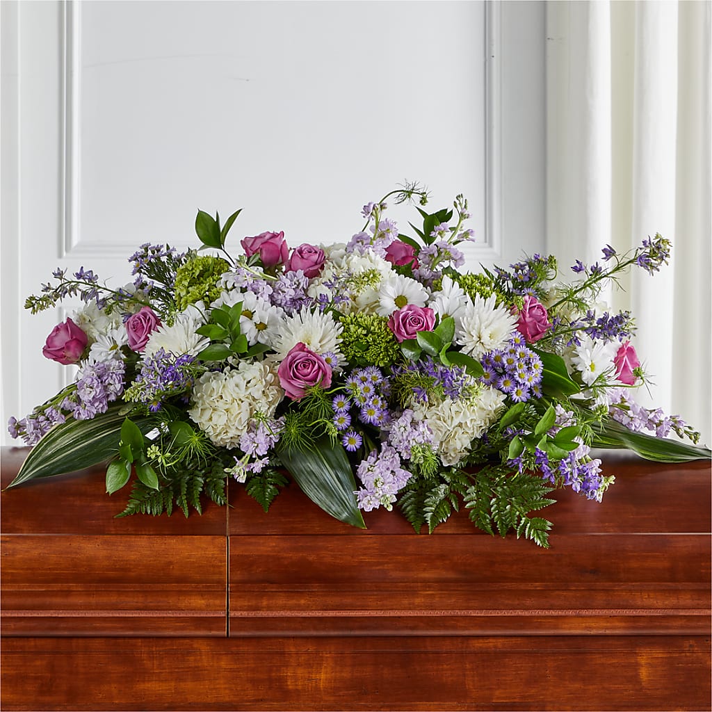 Meadows of Serenity Casket Spray flower arrangement by Honeybee Floral
