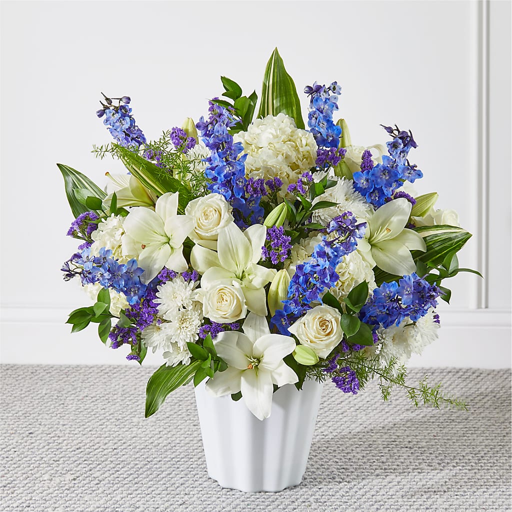 Take Comfort Floor Basket flower arrangement by Honeybee Floral