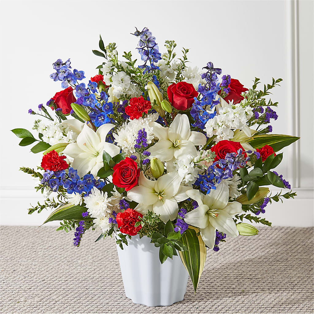 Consoled Floor Basket flower arrangement by Honeybee Floral