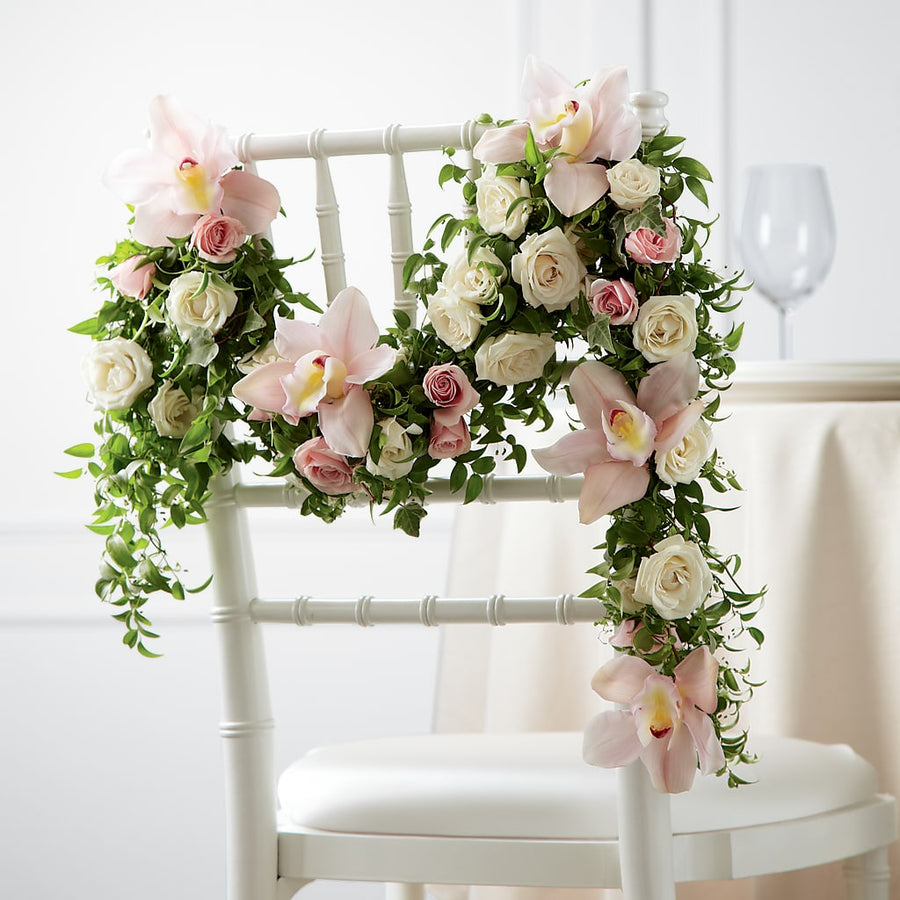 Orchid Rose Chair Décor flower arrangement by Honeybee Floral
