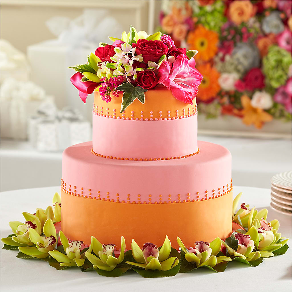 Sweet Citrus Cake Decor flower arrangement by Honeybee Floral