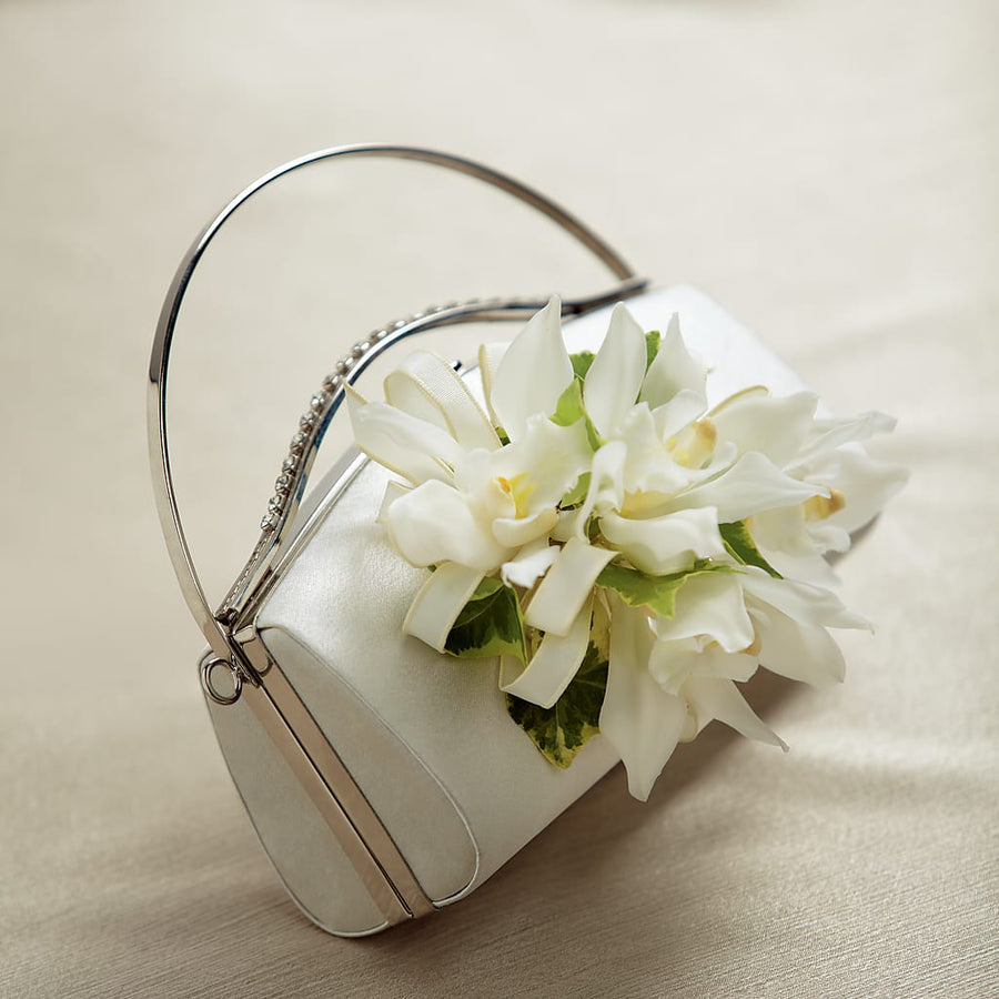 White Purse Decor flower arrangement by Honeybee Floral