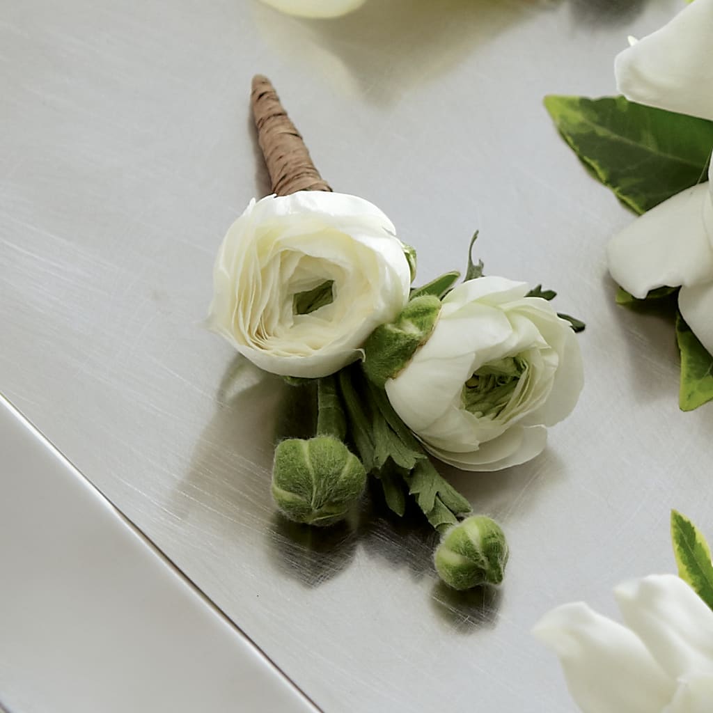 White Ranunculus Boutonniere flower arrangement by Honeybee Floral