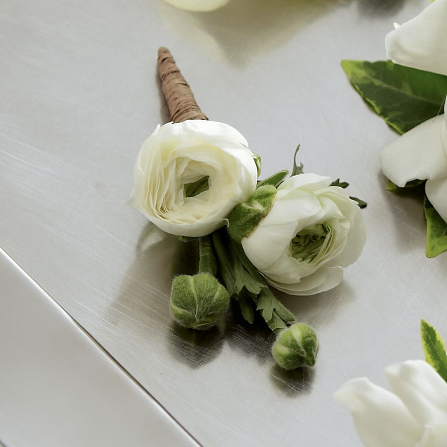 White Ranunculus Boutonniere flower arrangement by Honeybee Floral